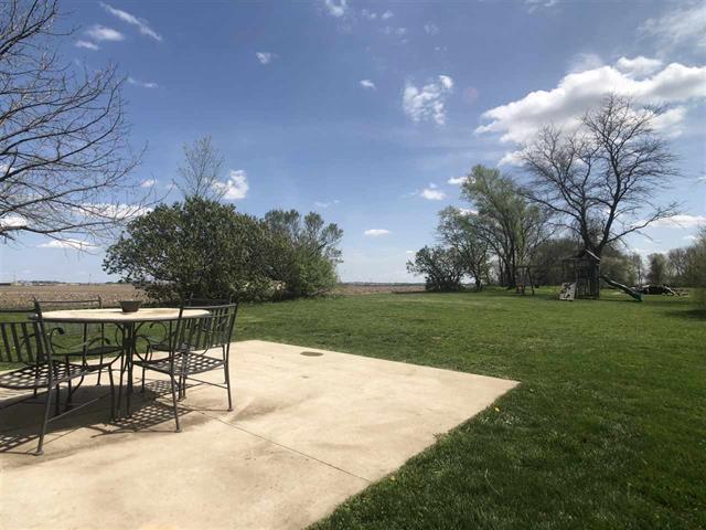 9987 East High Road Stillman Valley, IL 61084 - Photo 23 of 25 a view of a backyard with sitting area