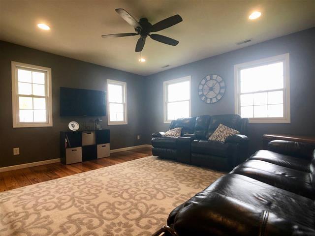 9987 East High Road Stillman Valley, IL 61084 - Photo 7 of 25 a living room with furniture and a window