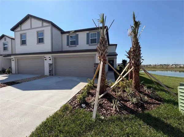 a house view with a backyard space