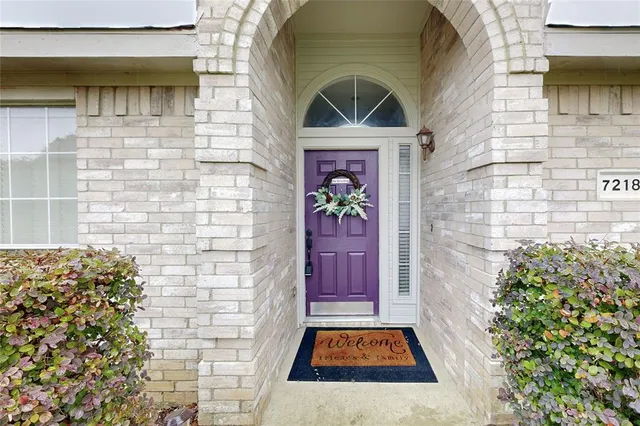 a front view of a house with yard
