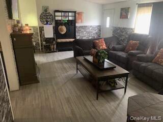76 Parks Road Livingston Manor, NY 12758 - Photo 4 of 15 Living area featuring wood finished floors