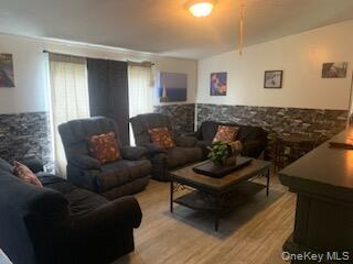 76 Parks Road Livingston Manor, NY 12758 - Photo 6 of 15 Living room with wood finished floors