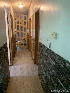 76 Parks Road Livingston Manor, NY 12758 - Photo 8 of 15 Hallway featuring light wood-style flooring