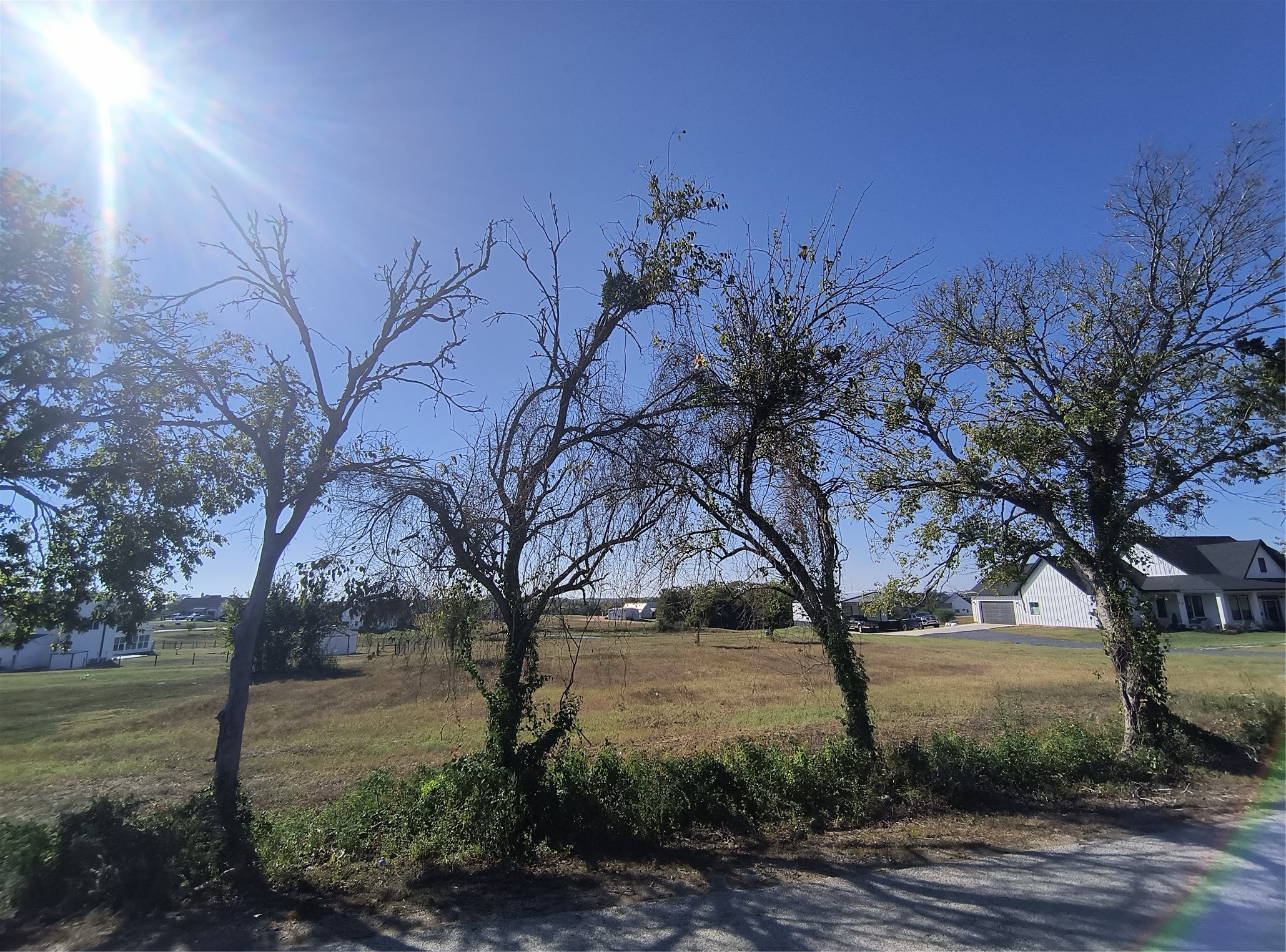 3660 Wonder Hill Road Brenham, TX 77833 - Photo 2 of 5 a view of lake with outdoor space