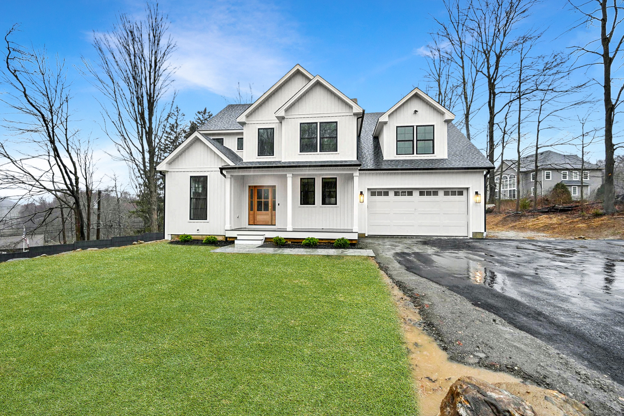 1 Elwell Road New Fairfield, CT 06812 - Photo 1 of 1 a front view of a house with a yard