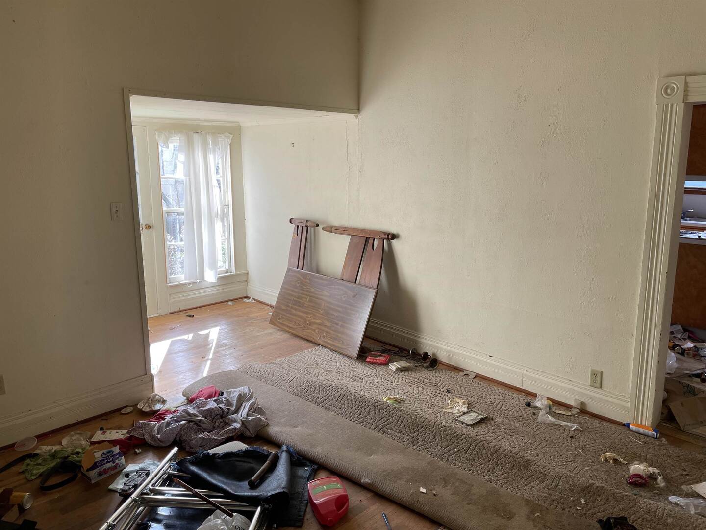 209 South 16th Street Herrin, IL 62948 - Photo 14 of 38 a bedroom with a bed and wooden floor