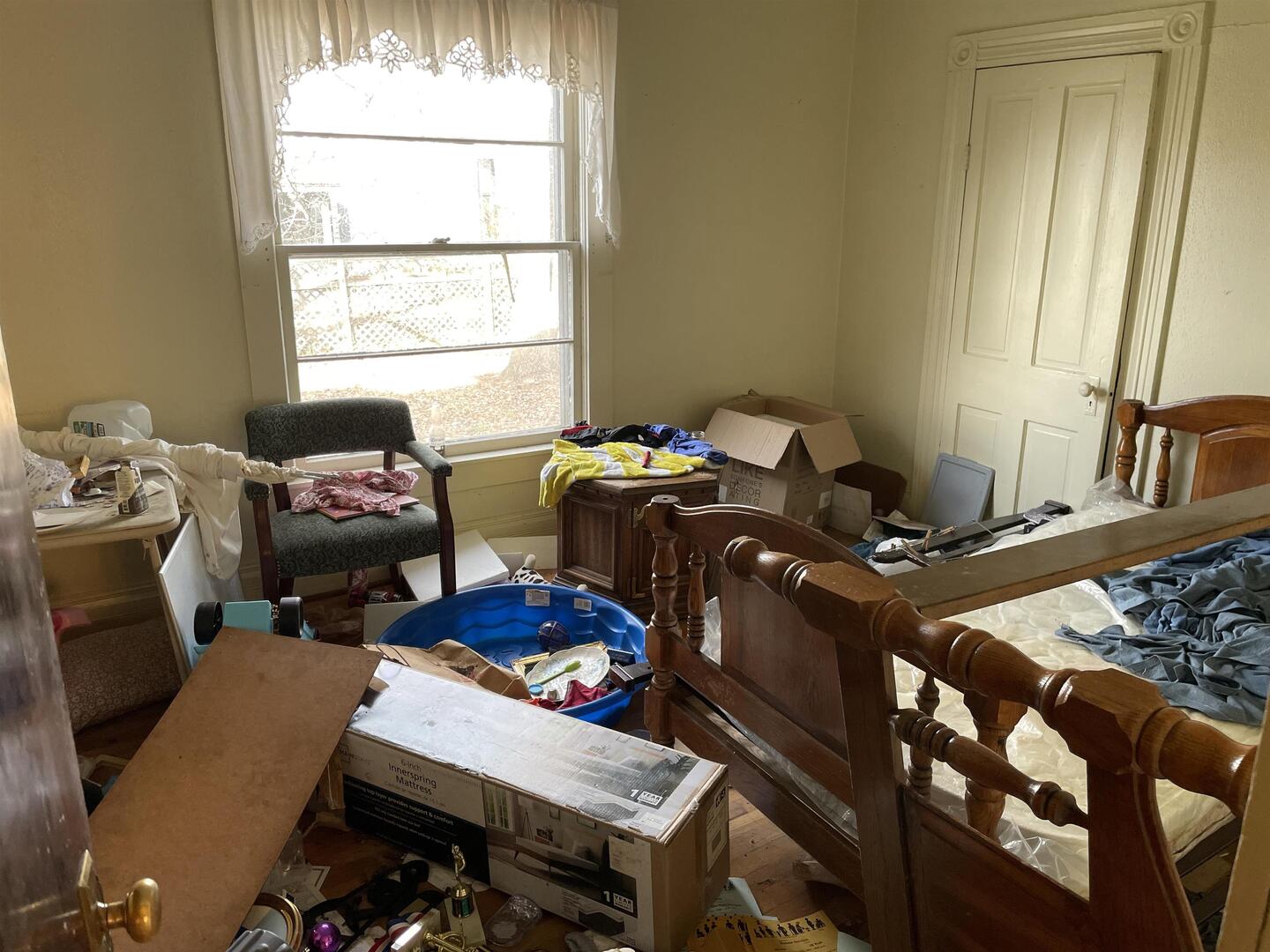 209 South 16th Street Herrin, IL 62948 - Photo 23 of 38 a room with furniture a window and a chandelier