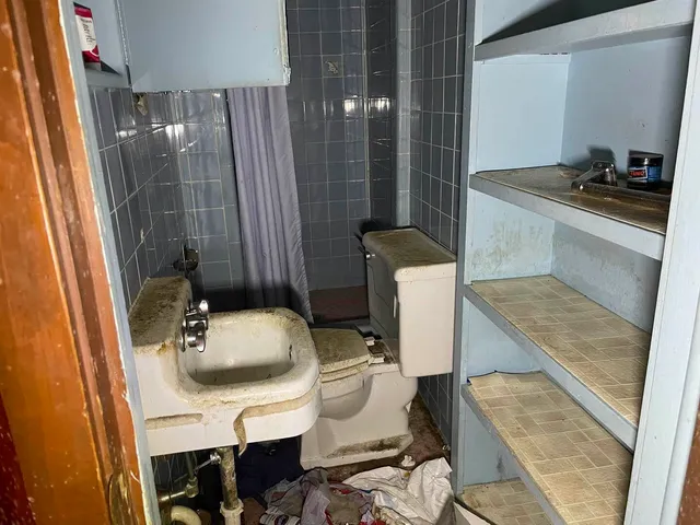 a view of a workspace with furniture