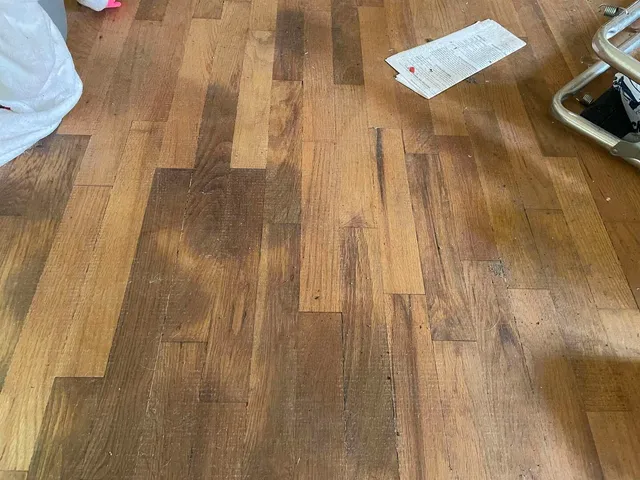 a bathroom with a granite countertop tub