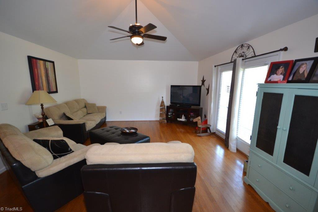 2497 Danny Bell Road Asheboro, NC 27205 - Photo 2 of 20 Great room - hardwood flooring - vaulted ceiling