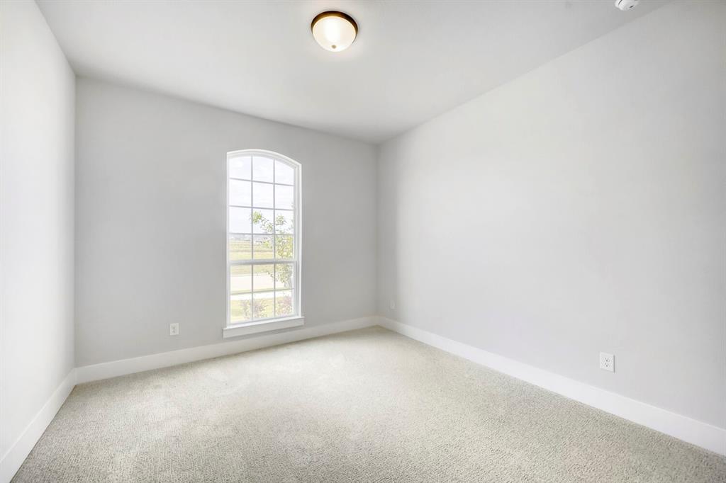 799 Mandrake Road Haslet, TX 76052 - Photo 18 of 27 an empty room with windows