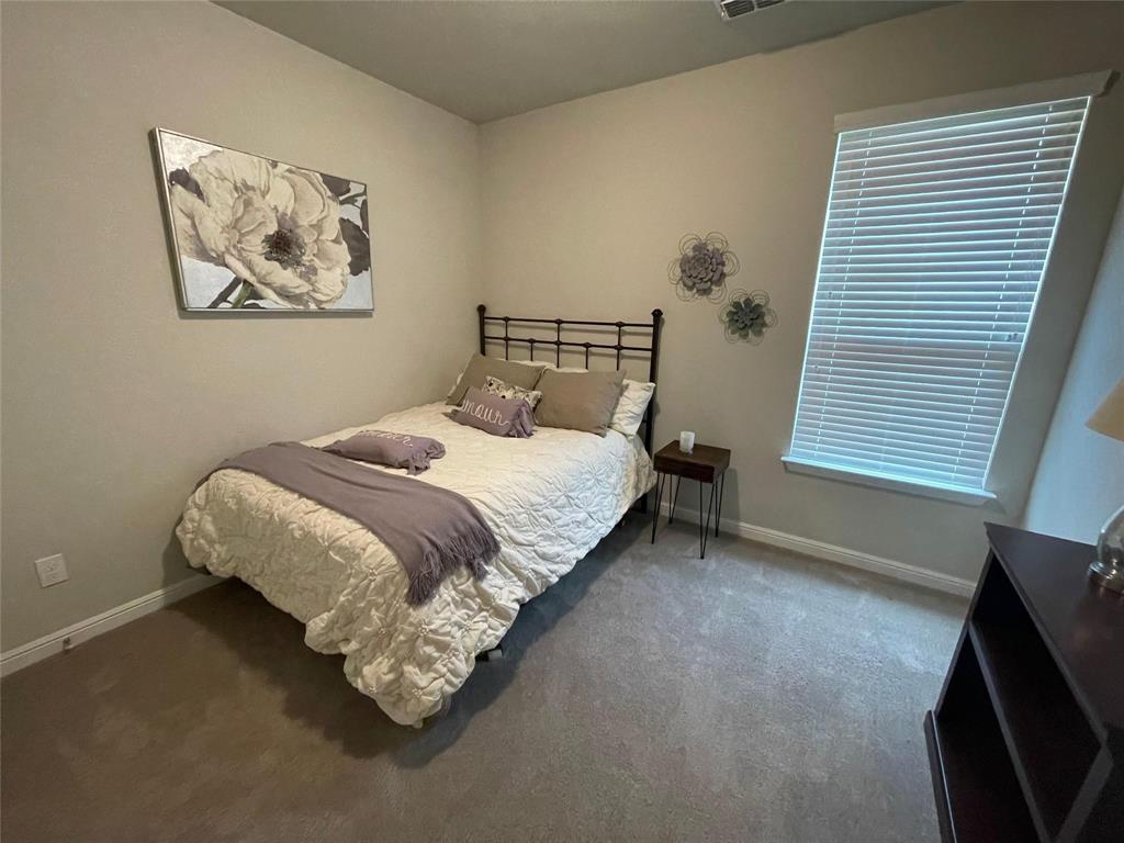 1904 Cardinal Way Argyle, TX 76226 - Photo 17 of 17 a bedroom with a bed and a window