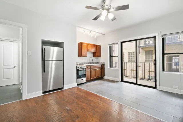 a view of a kitchen with a stove cabinets and a kitchen