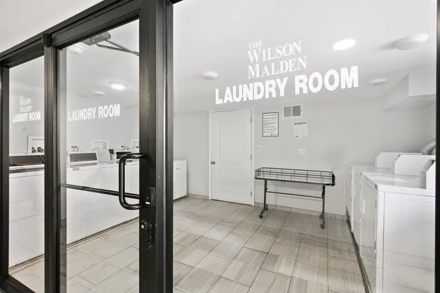 a view of a hallway with a furniture