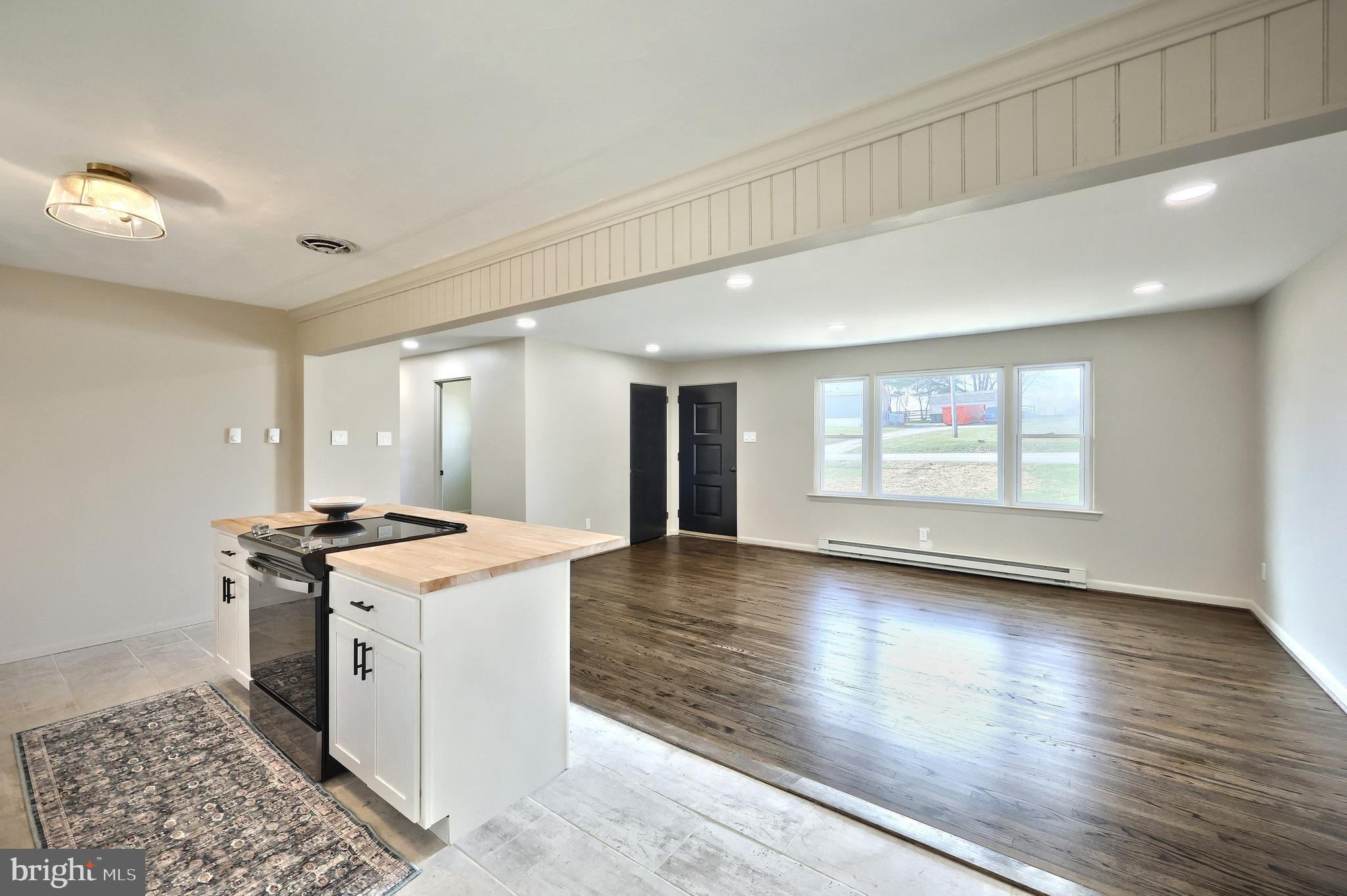 880 Springvale Road Red Lion, PA 17356 - Photo 14 of 39 a kitchen with stainless steel appliances granite countertop a stove and a refrigerator