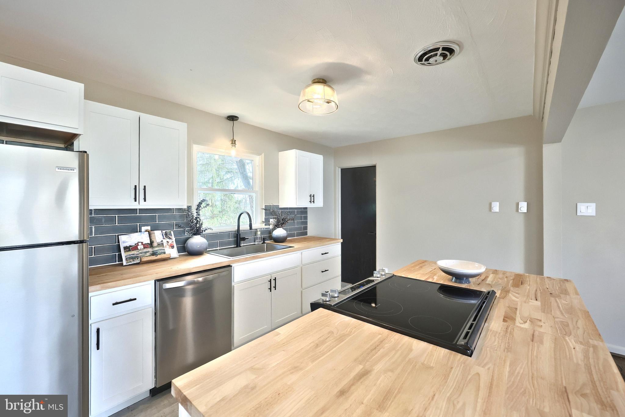 880 Springvale Road Red Lion, PA 17356 - Photo 18 of 39 a kitchen with a sink appliances and cabinets