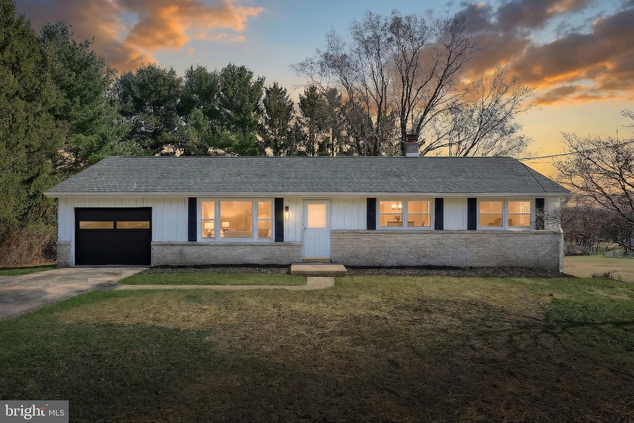 880 Springvale Road Red Lion, PA 17356 - Photo 2 of 39 a house that has a big yard in front of it