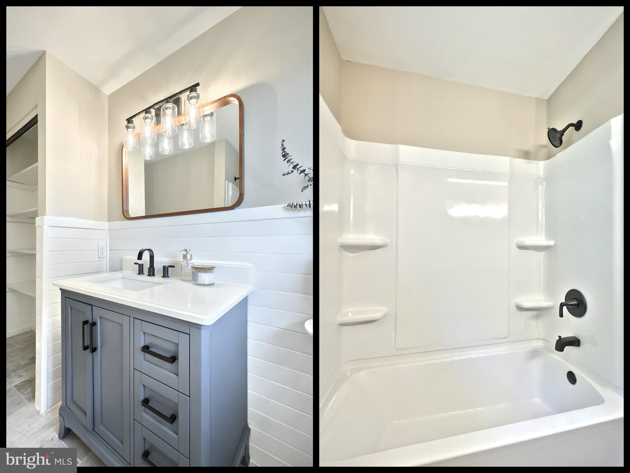 880 Springvale Road Red Lion, PA 17356 - Photo 21 of 39 a bathroom with a bathtub sink vanity and mirror