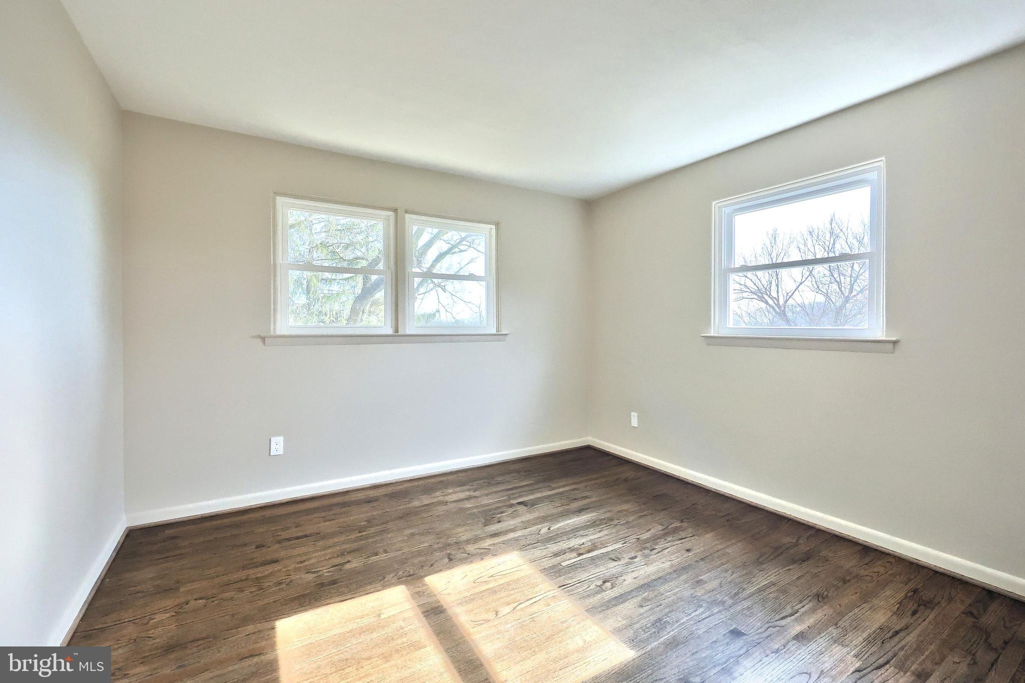 880 Springvale Road Red Lion, PA 17356 - Photo 24 of 39 a view of empty room with wooden floor and fan