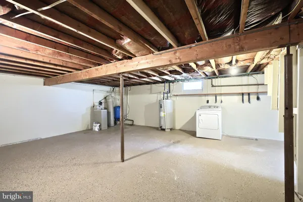 a utility room with cabinets