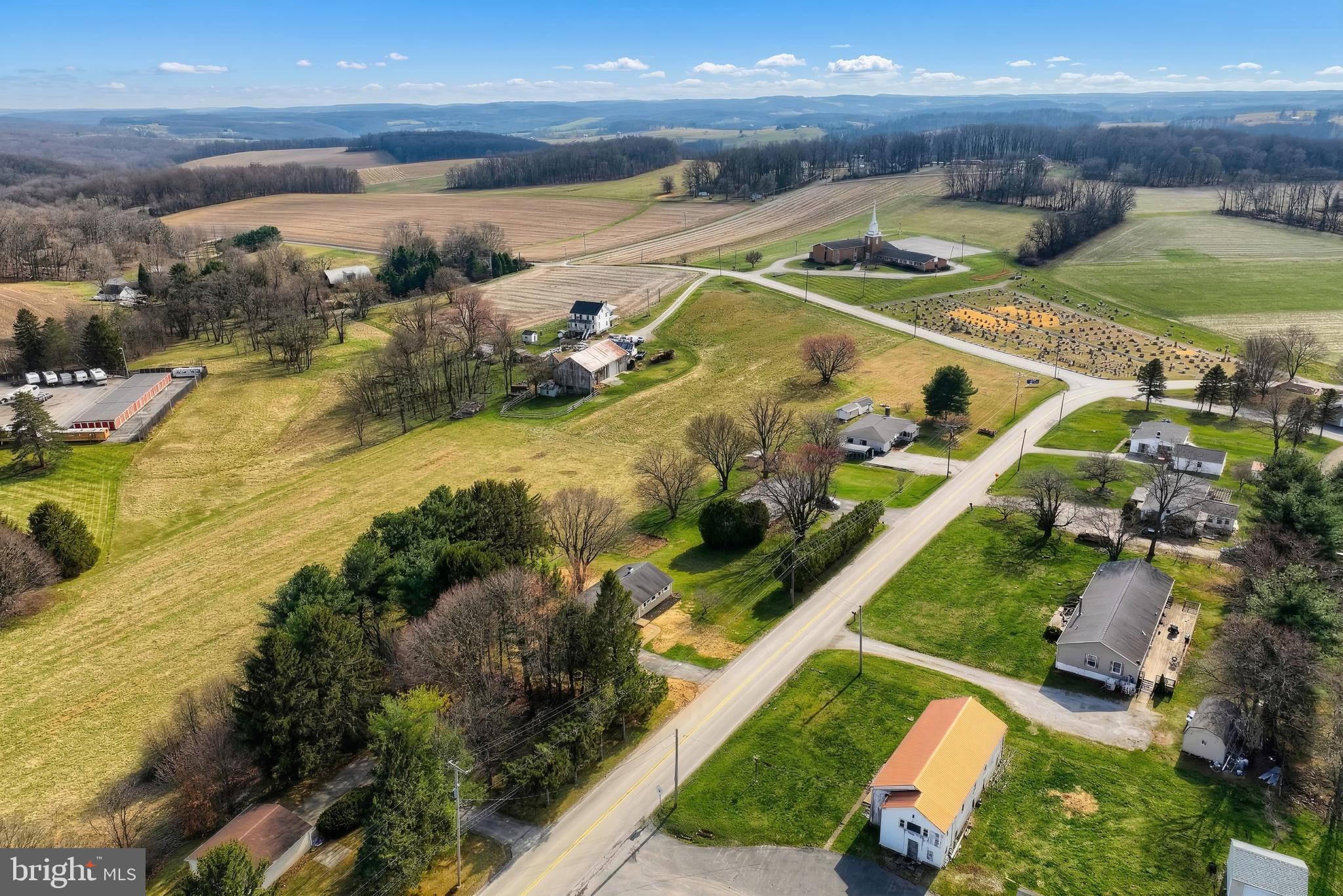 880 Springvale Road Red Lion, PA 17356 - Photo 35 of 39 a view of a swimming pool with an outdoor seating