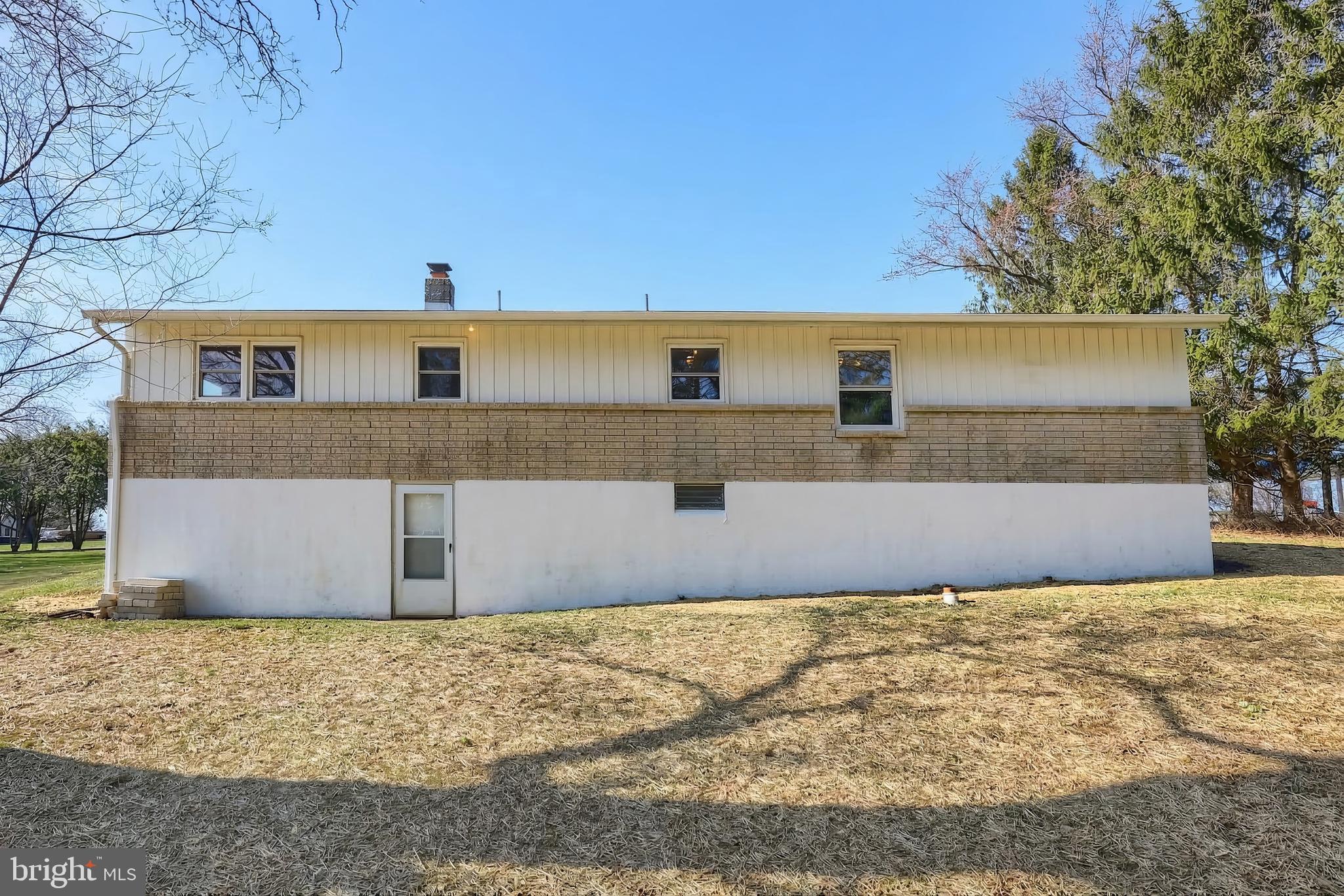 880 Springvale Road Red Lion, PA 17356 - Photo 4 of 39 a front view of a house with a yard