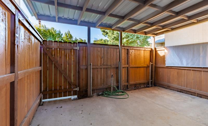 6646 North 3rd Street Fresno, CA 93710 - Photo 16 of 19 a view of a backyard with wooden fence
