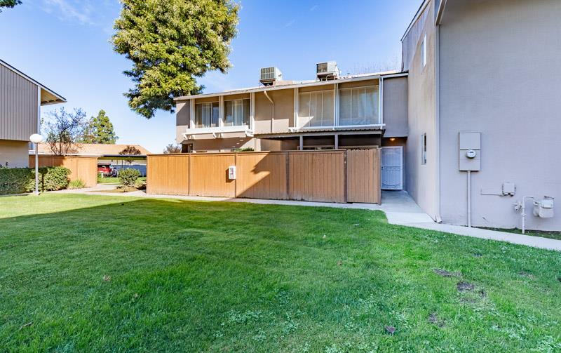 6646 North 3rd Street Fresno, CA 93710 - Photo 18 of 19 a view of a backyard with a garden and plants