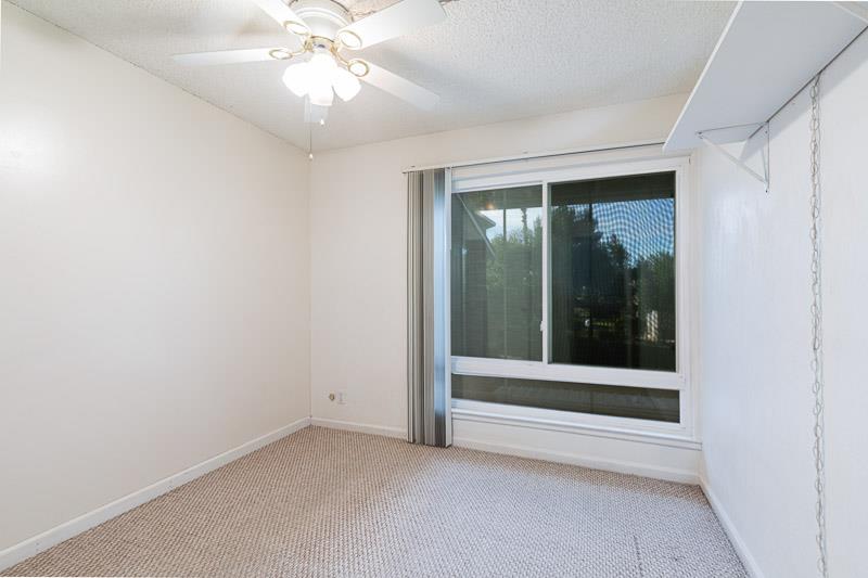 6646 North 3rd Street Fresno, CA 93710 - Photo 9 of 19 an empty room with a window