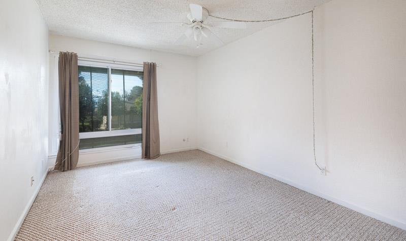 6646 North 3rd Street Fresno, CA 93710 - Photo 10 of 19 an empty room with windows