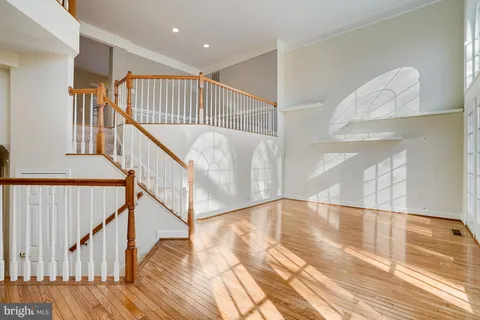 a view of entryway with wooden floor