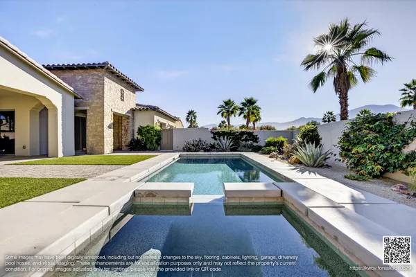 a view of a house with swimming pool