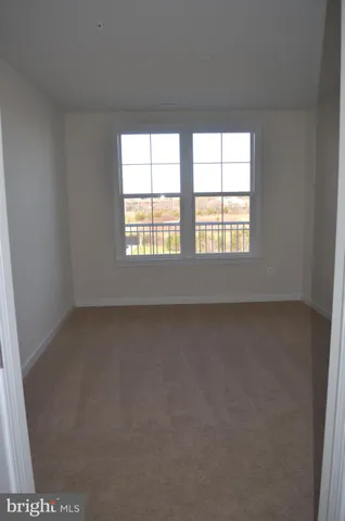 $2,450 | 13724 Neil Armstrong Avenue, Unit 307, Herndon, VA 20171