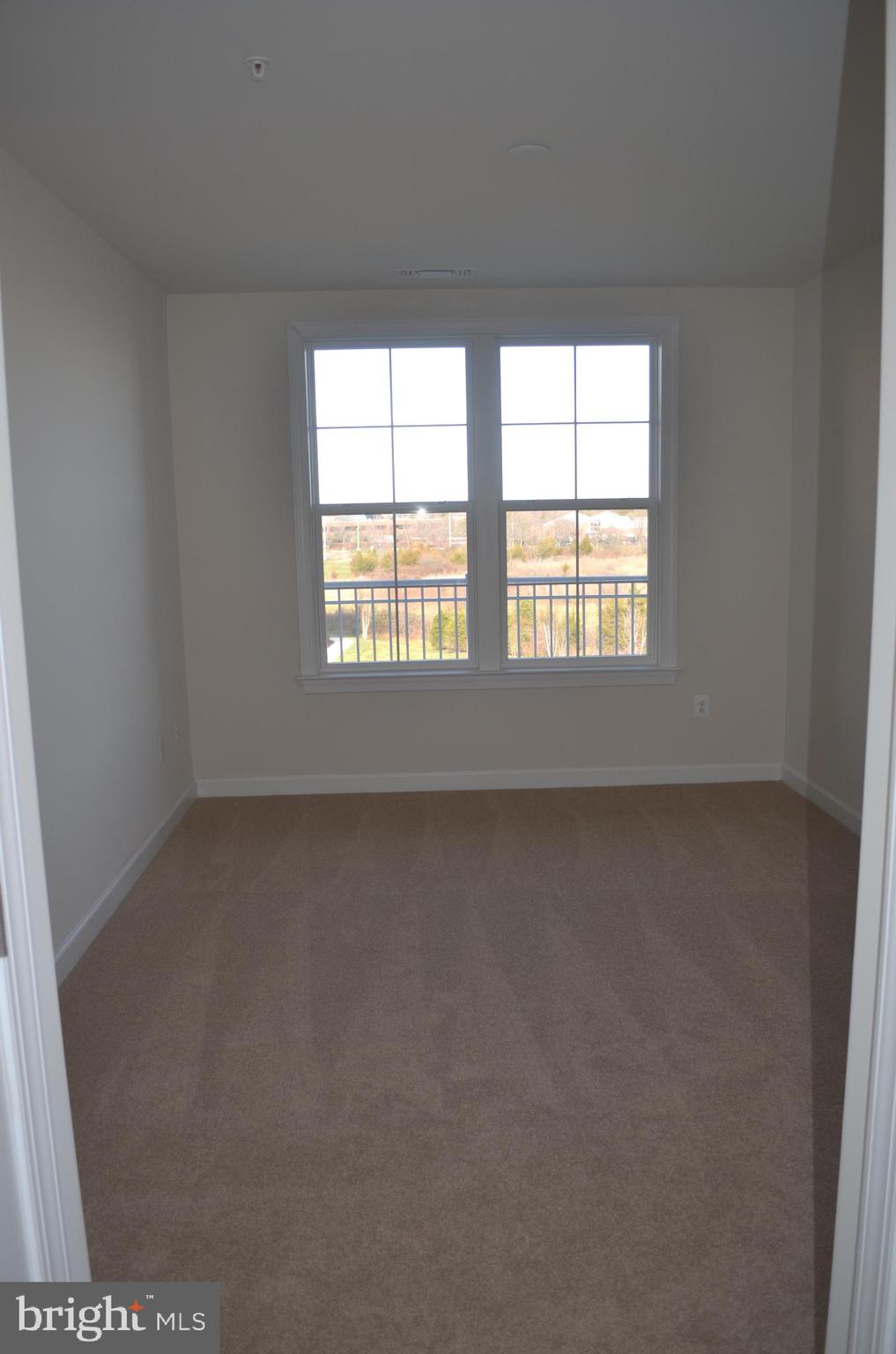 13724 Neil Armstrong Avenue, Unit 307 Herndon, VA 20171 - Photo 8 of 20 Primary Bedroom