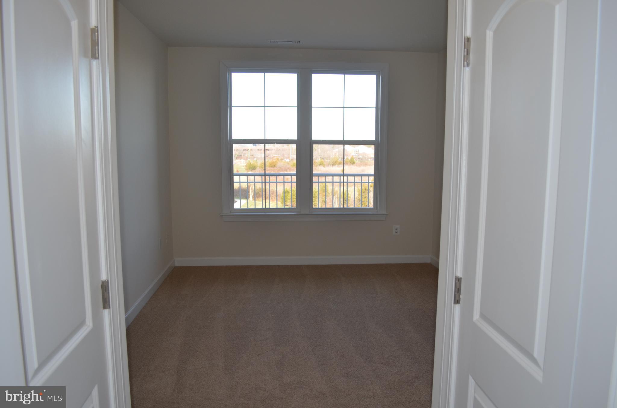 13724 Neil Armstrong Avenue, Unit 307 Herndon, VA 20171 - Photo 9 of 20 Primary Bedroom
