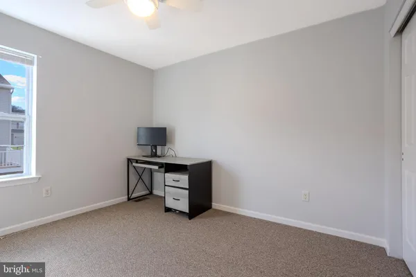 a room with a table and a window