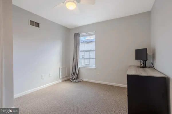 a view of workspace with a flat screen tv