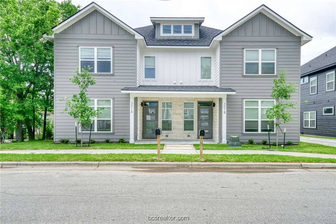 301 Cooner Street, Unit B College Station, TX 77840 - Photo 1 of 36 a front view of a house with a yard and trees