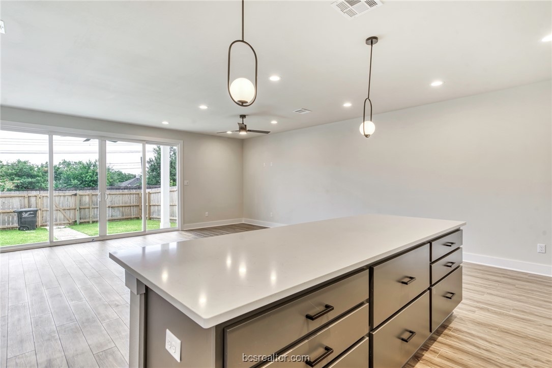301 Cooner Street, Unit B College Station, TX 77840 - Photo 11 of 36 an empty room with wooden floor