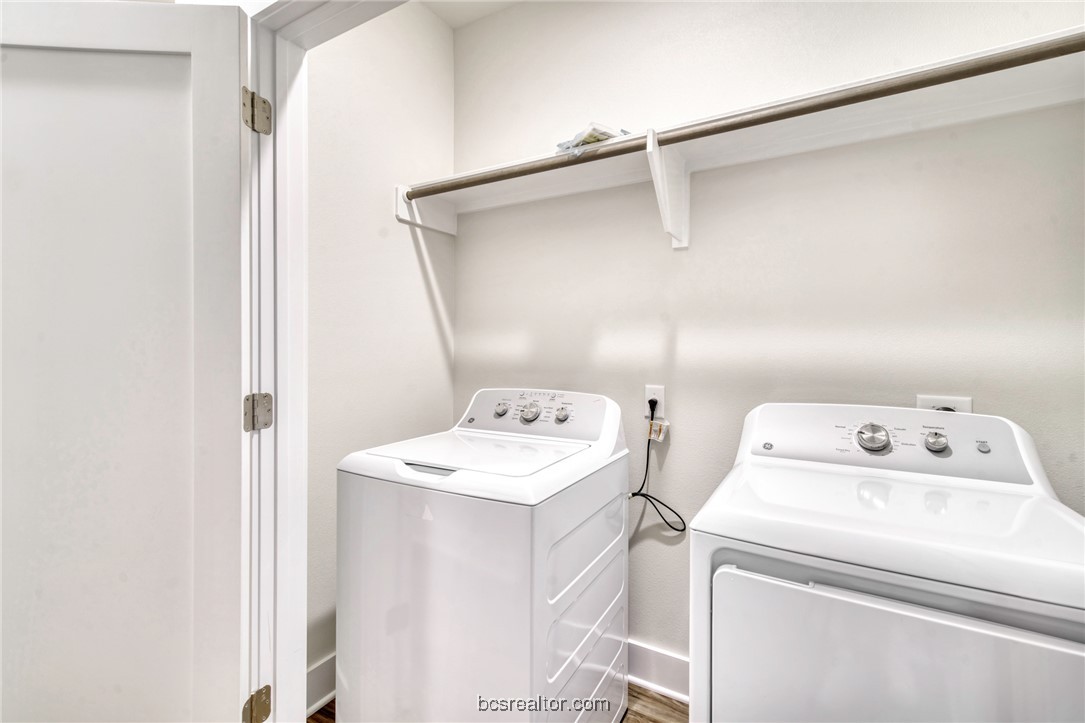 301 Cooner Street, Unit B College Station, TX 77840 - Photo 28 of 36 a utility room with dryer and washer