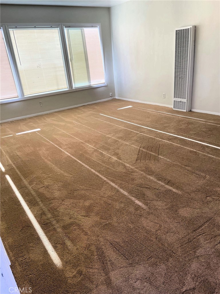 1405 South Broadway Santa Ana, CA 92707 - Photo 5 of 11 a view of an empty room with a window