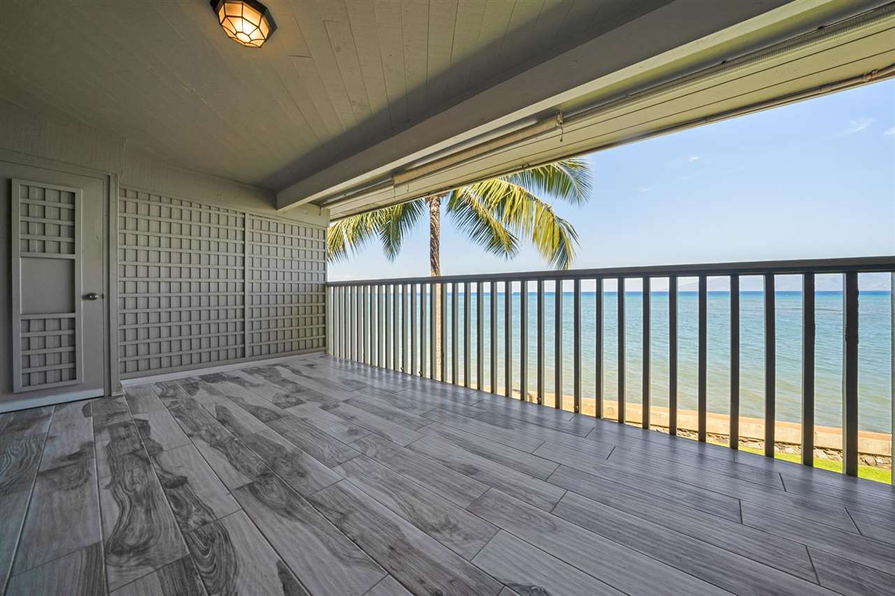 Lower Honoapiilani Road, Unit 210 Lahaina, HI 96761 - Photo 15 of 29 a view of backyard with wooden floor