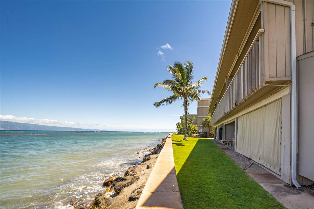 Lower Honoapiilani Road, Unit 210 Lahaina, HI 96761 - Photo 19 of 29 a view of a swimming pool with a balcony