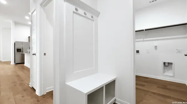 a bathroom with a shower and a sink