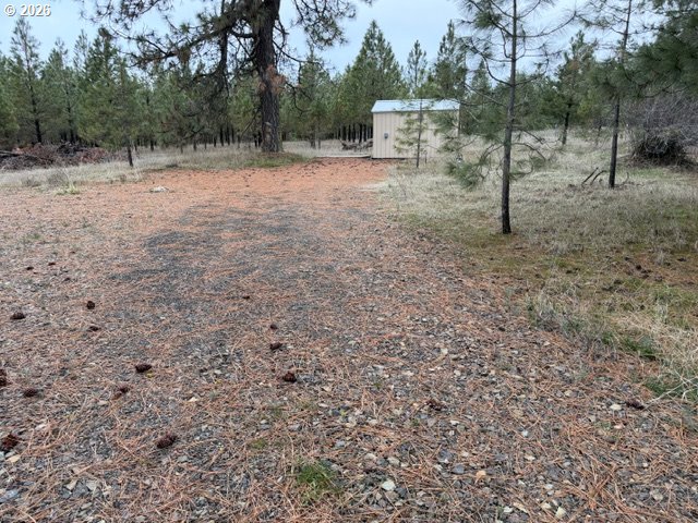 Garrison Road, Unit 1 2 3 Goldendale, WA 98620 - Photo 6 of 32 a view of a outdoor space with trees