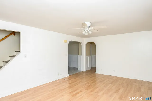 a view of a room with a large window