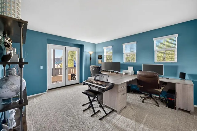 a view of a palm trees front of house