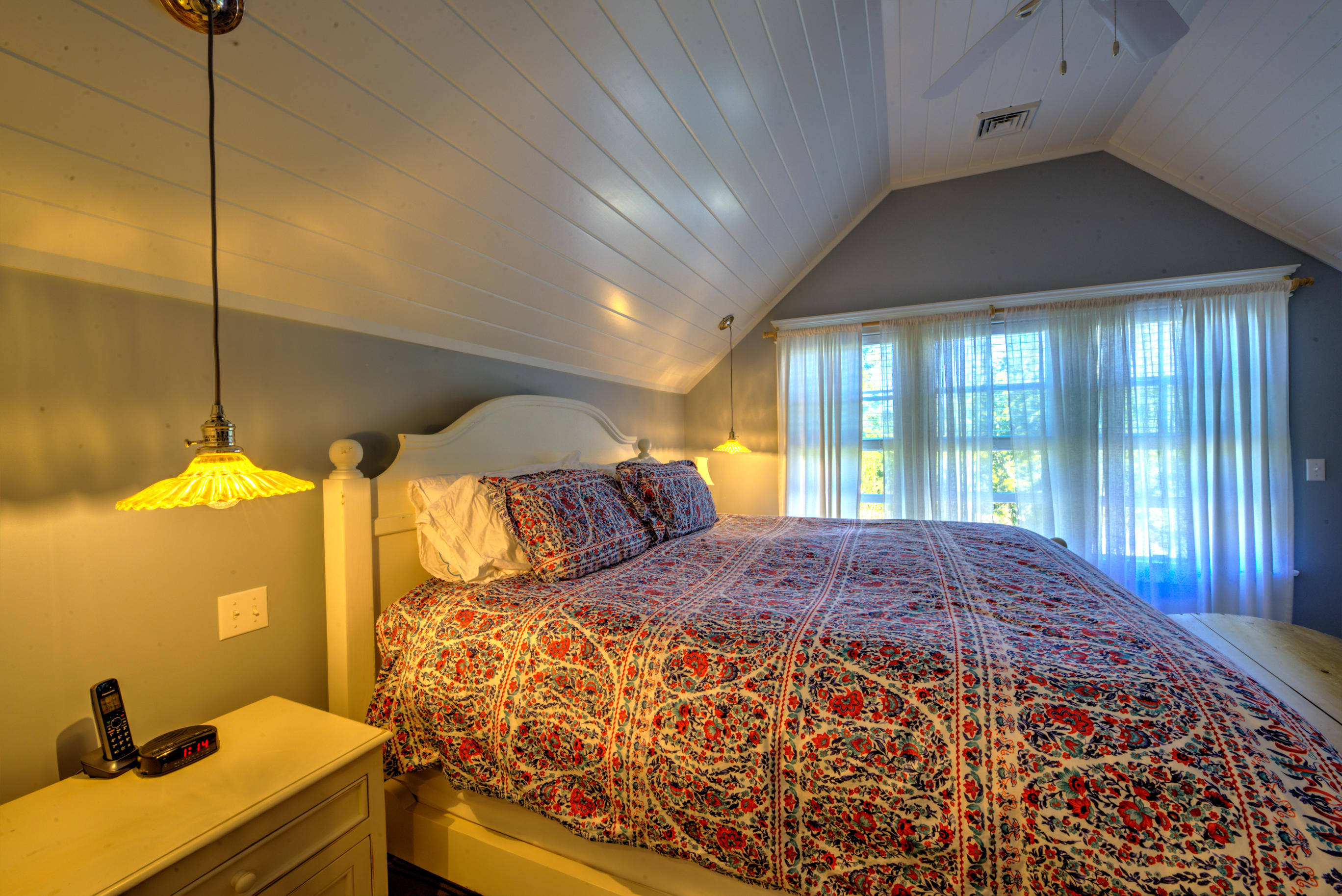 360 Main Street Osterville, MA 02655 - Photo 15 of 29 a bed sitting in a bedroom next to a window