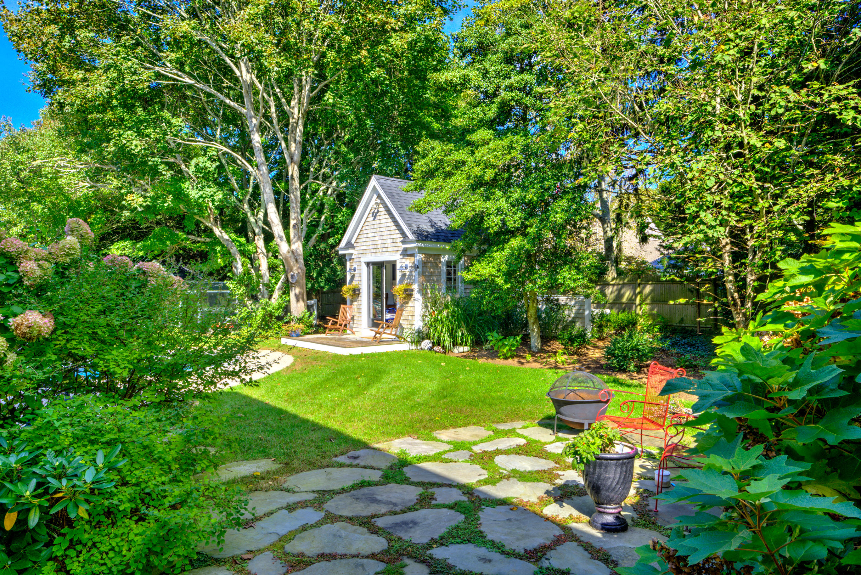 360 Main Street Osterville, MA 02655 - Photo 24 of 29 a front view of a house with a yard