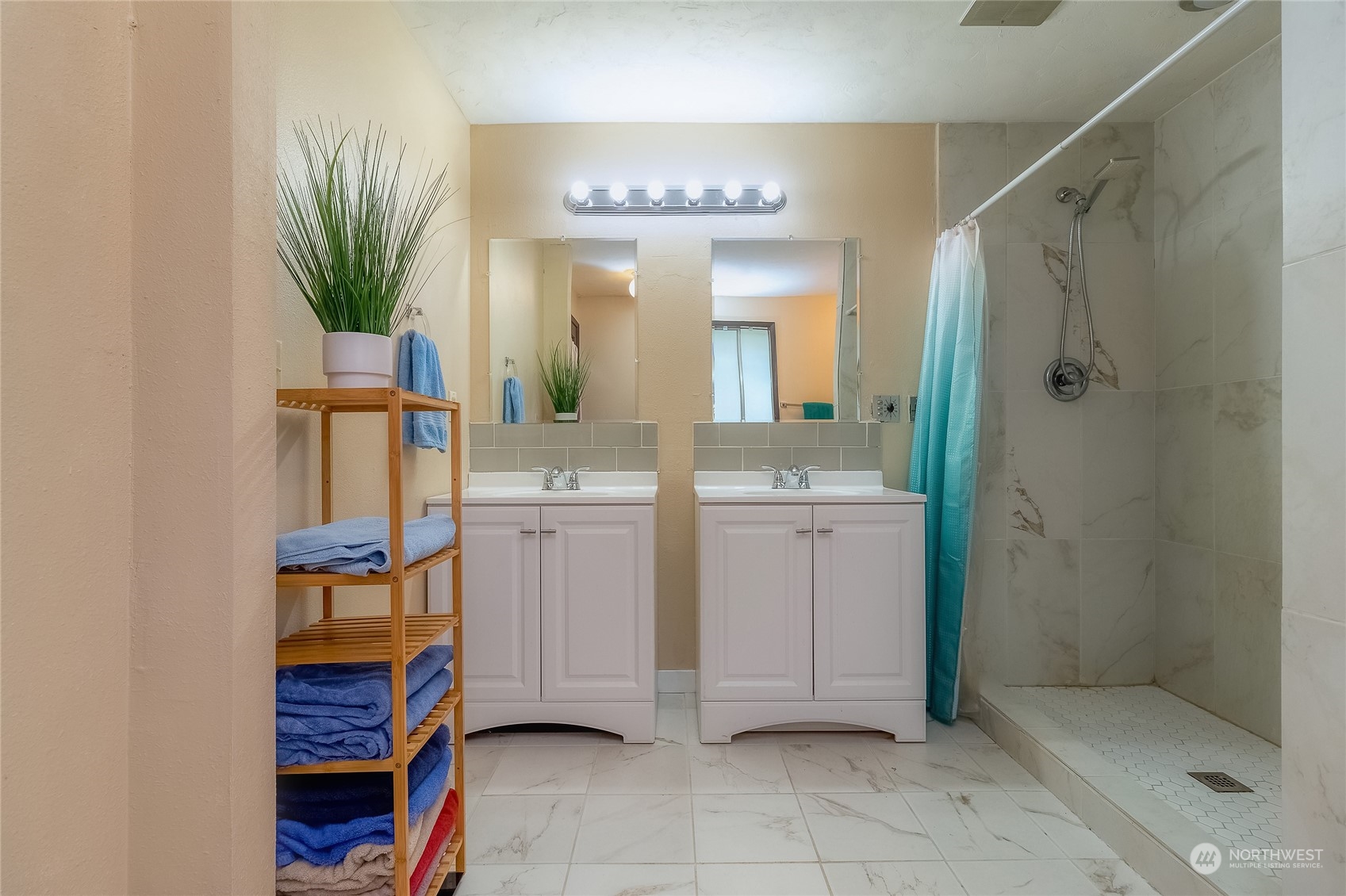326 Harrison Street Walla Walla, WA 99362 - Photo 19 of 28 a bathroom with a sink a light fixture and a mirror